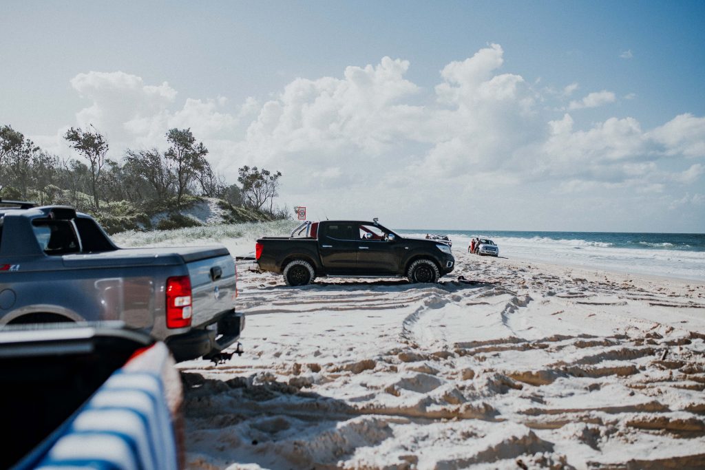 pickups parked seashore